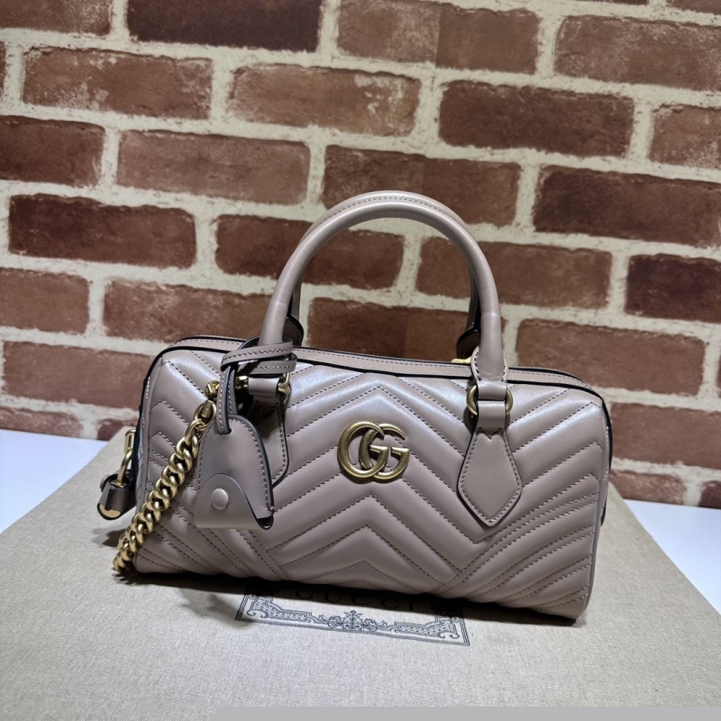 G*u*i top handle bags